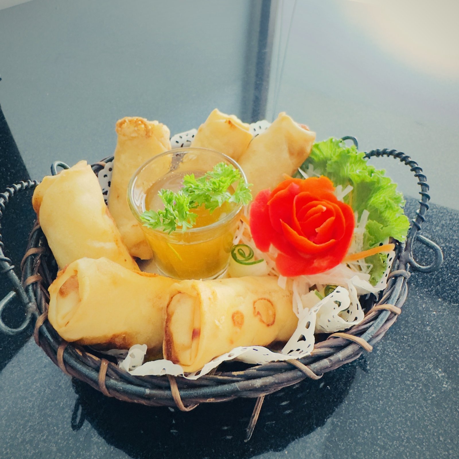 Por pia phak vegetable spring rolls in a woven basket with sweet chilli dip, RICE Bar + Restaurant, Patong